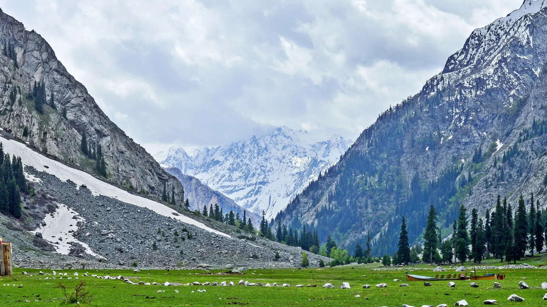 Green meadows and snowy peaks in Kalam Valley, Swat