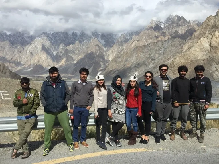 Group of travellers at a Passu viewpoint in Upper Hunza