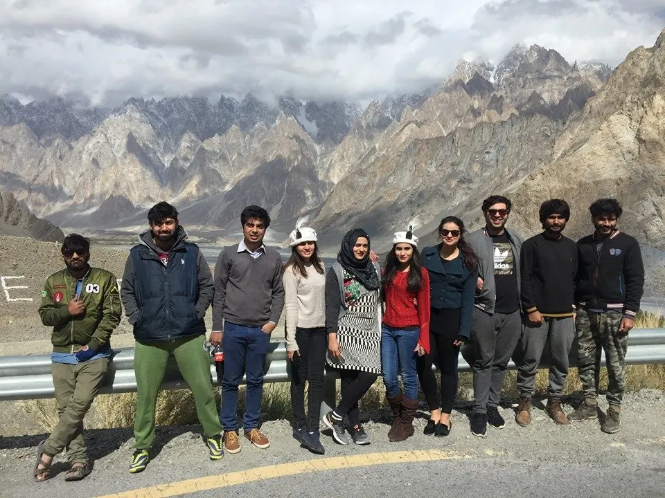 Group of travellers at a Passu viewpoint in Upper Hunza