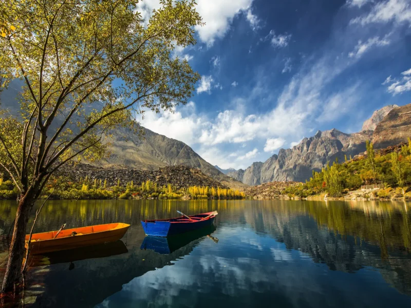 Upper Kachura Lake near Skardu with boats and autumn trees